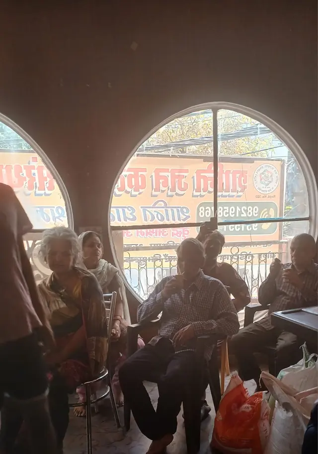 Residents together in the ashram hall