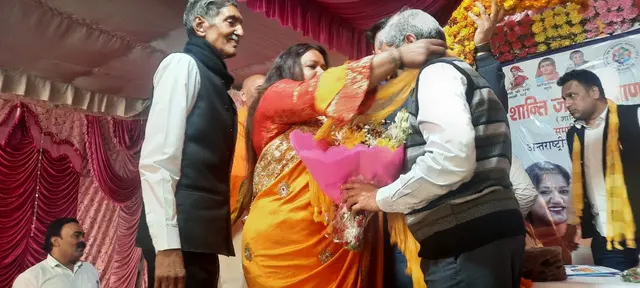Greeting a guest at the Women’s Day felicitation