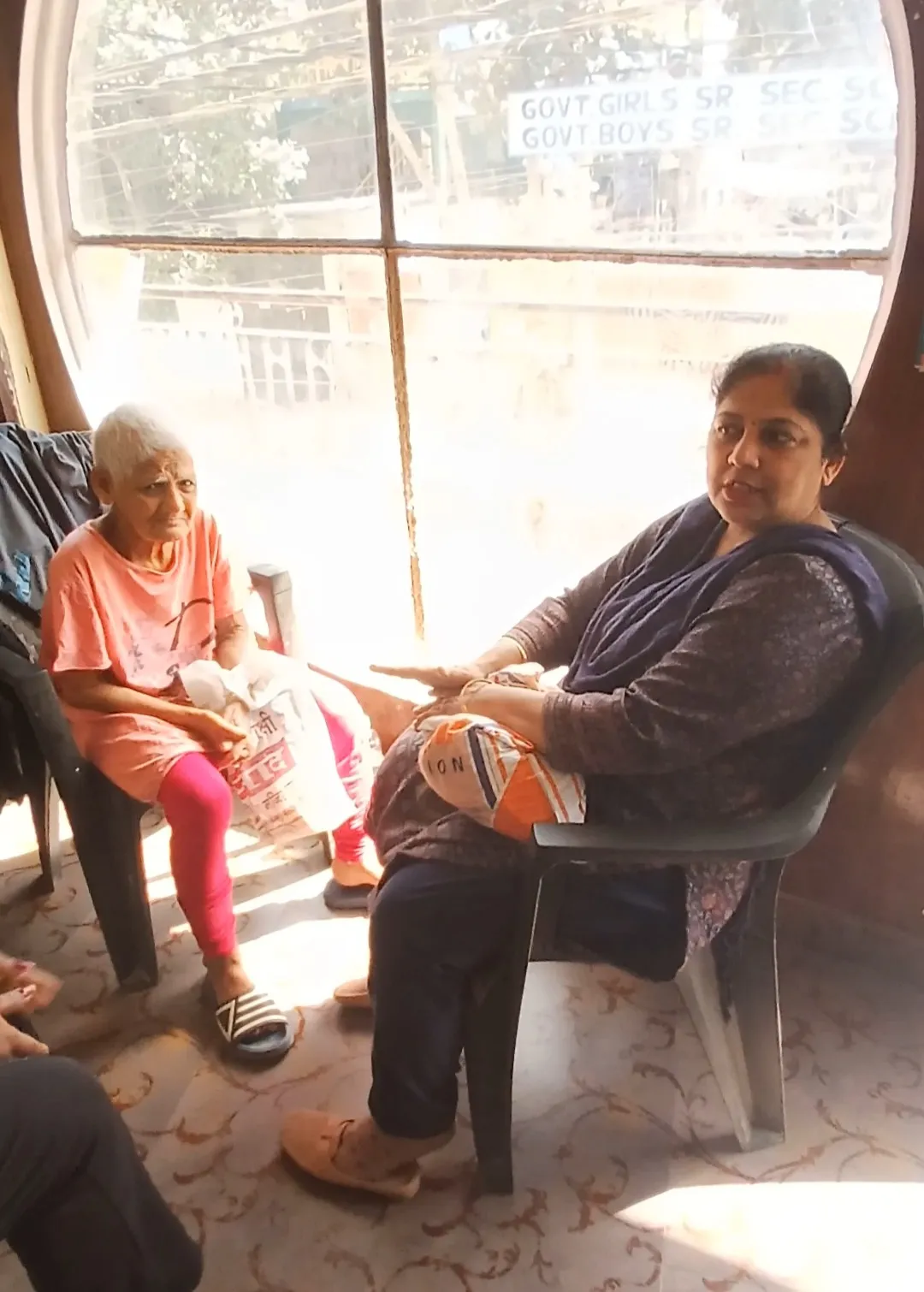 Conversation by the window at the ashram