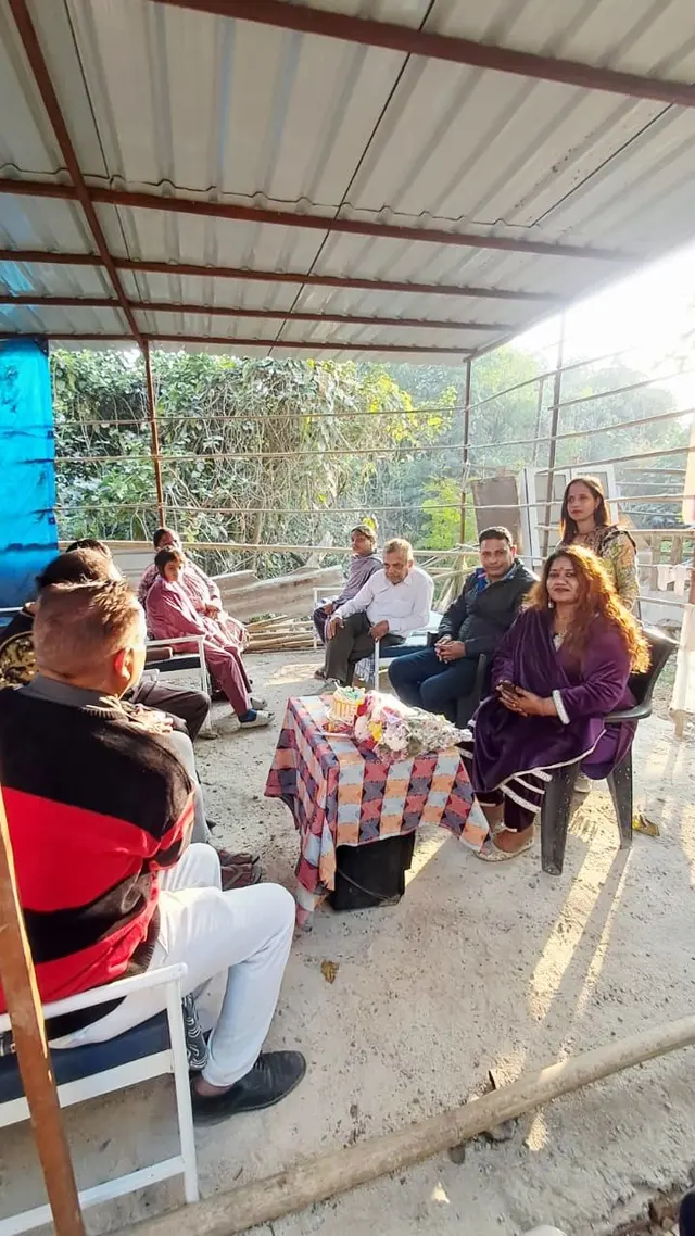 Sitting together by a fire on a winter morning